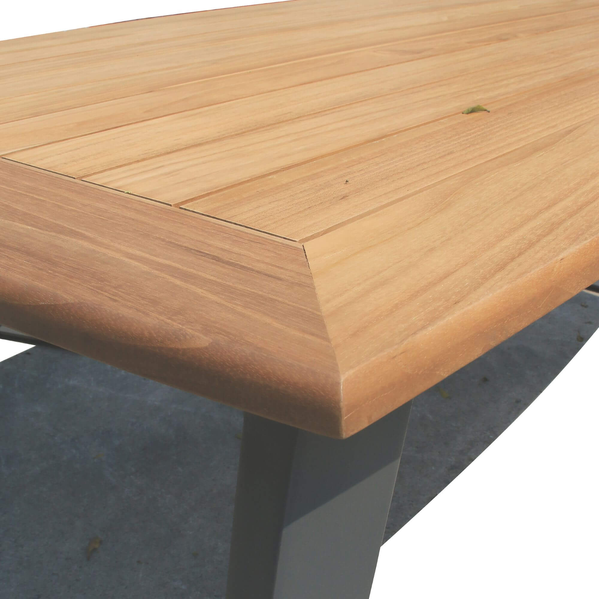 Wood coffee table with beveled top and dark gray metal legs