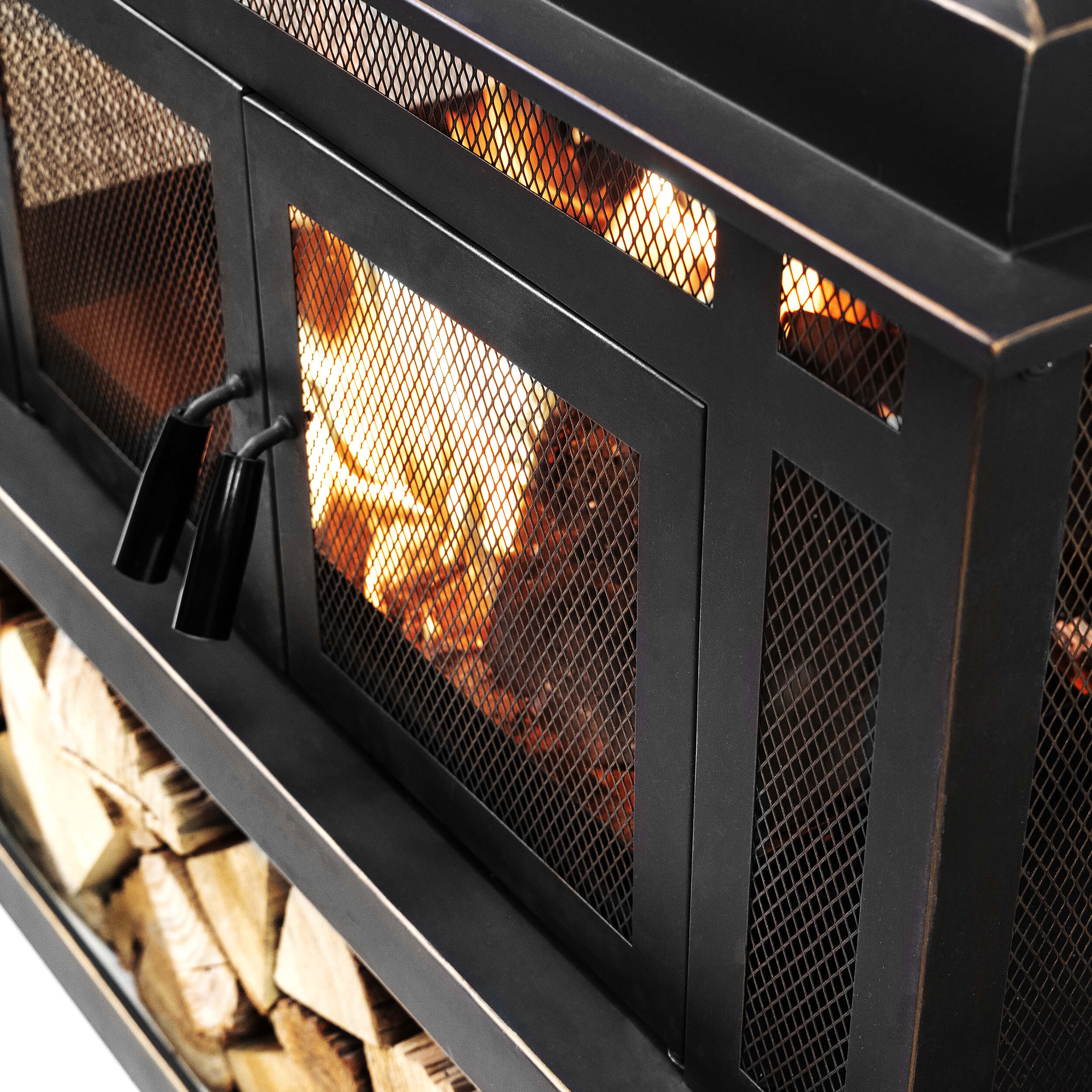 Metal wood burner fireplace with black mesh front and orange flame view