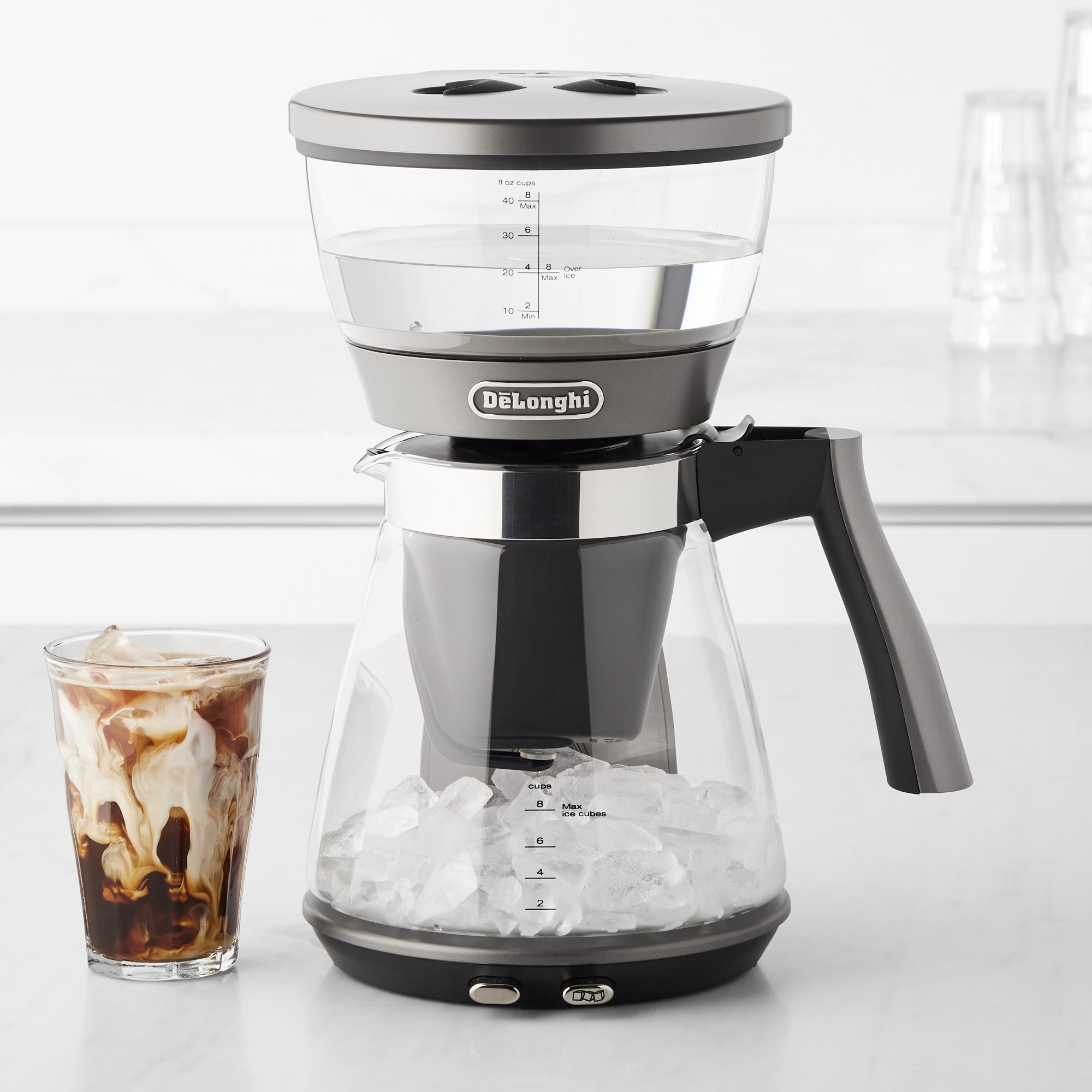 De'Longhi 3-in-1 specialty coffee brewer with clear water tank and black carafe handle