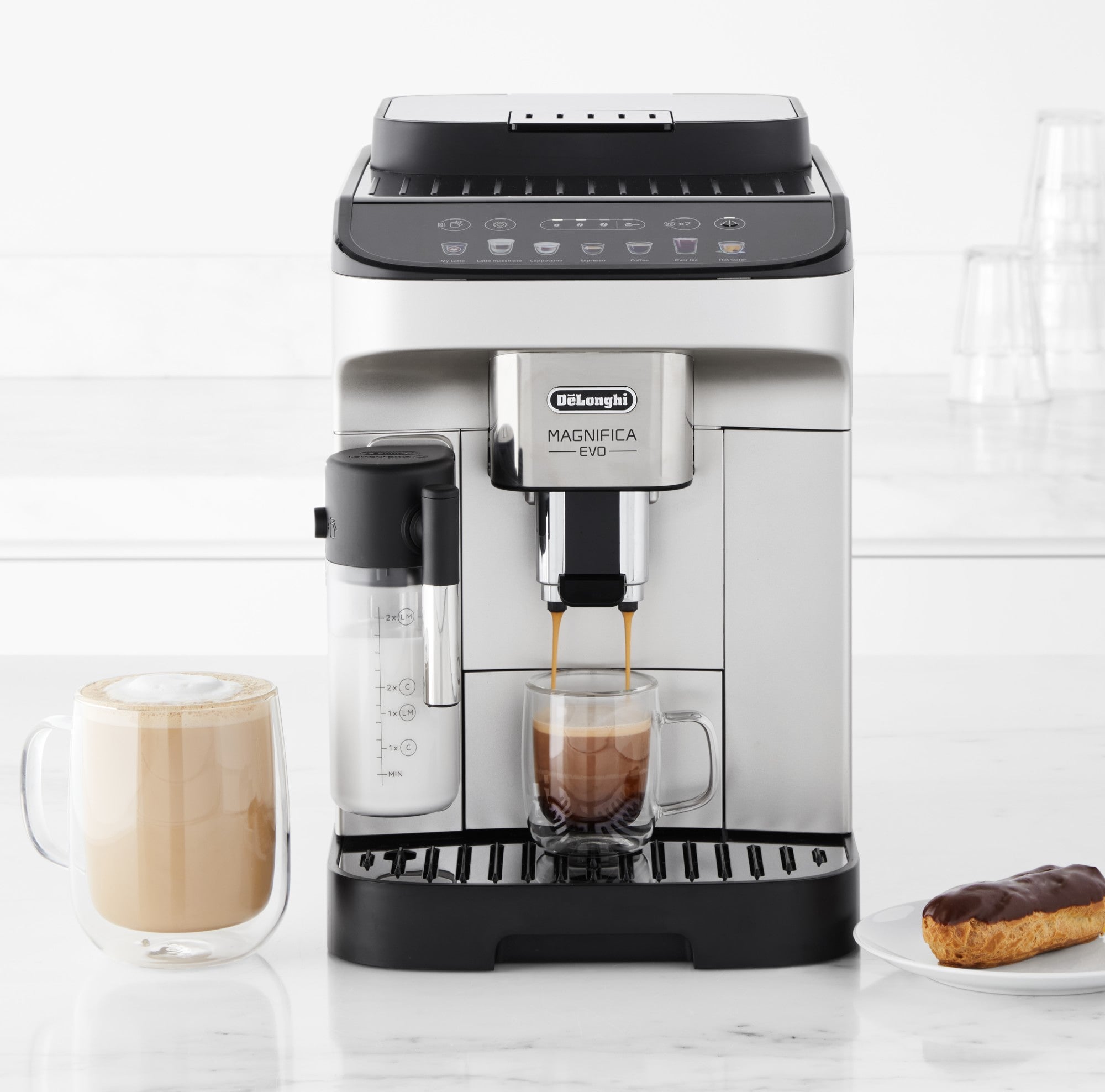 De'Longhi Magnifica Evo espresso machine dispensing coffee into two cups
