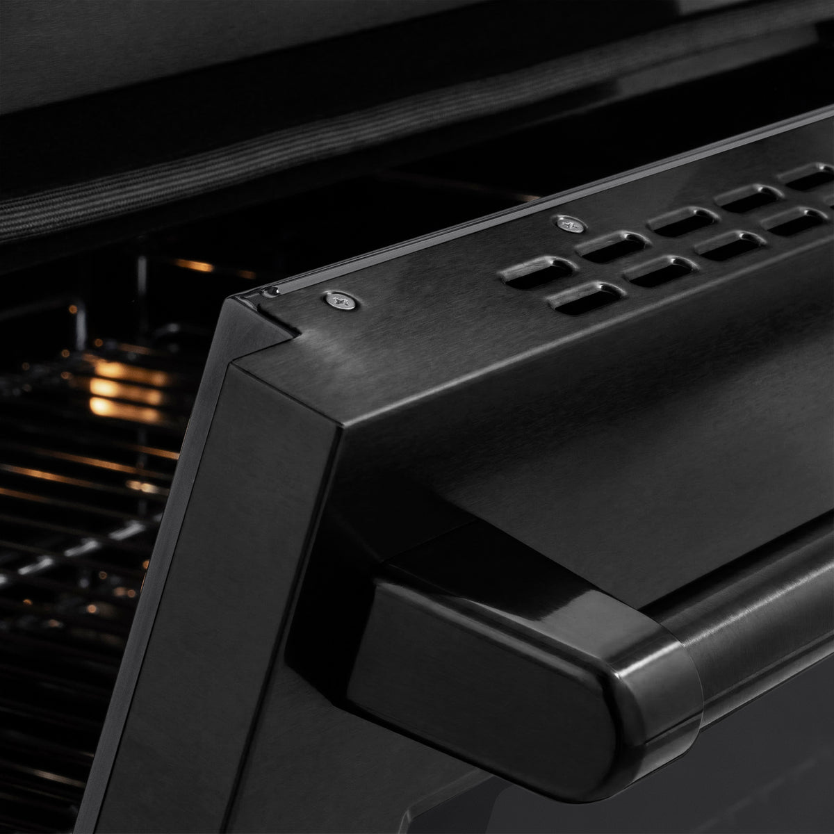 Close-up of the handle on the ZLINE Paramount Induction Range in Black Stainless Steel (SINRB-48)