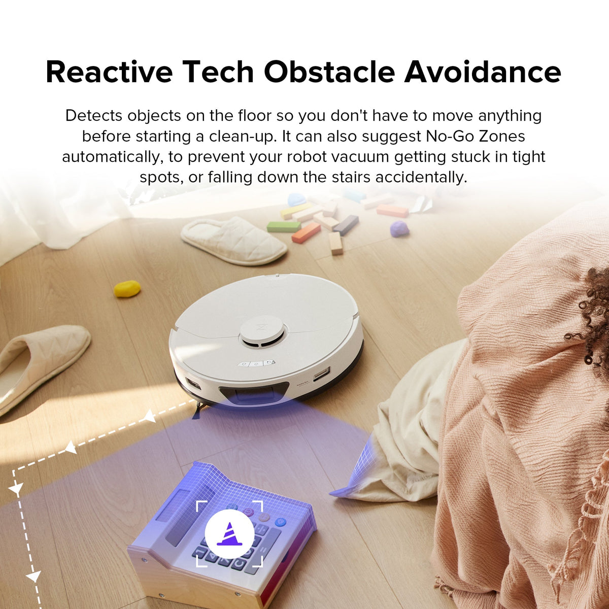 Robot vacuum on floor with obstacle-detection sensor light
