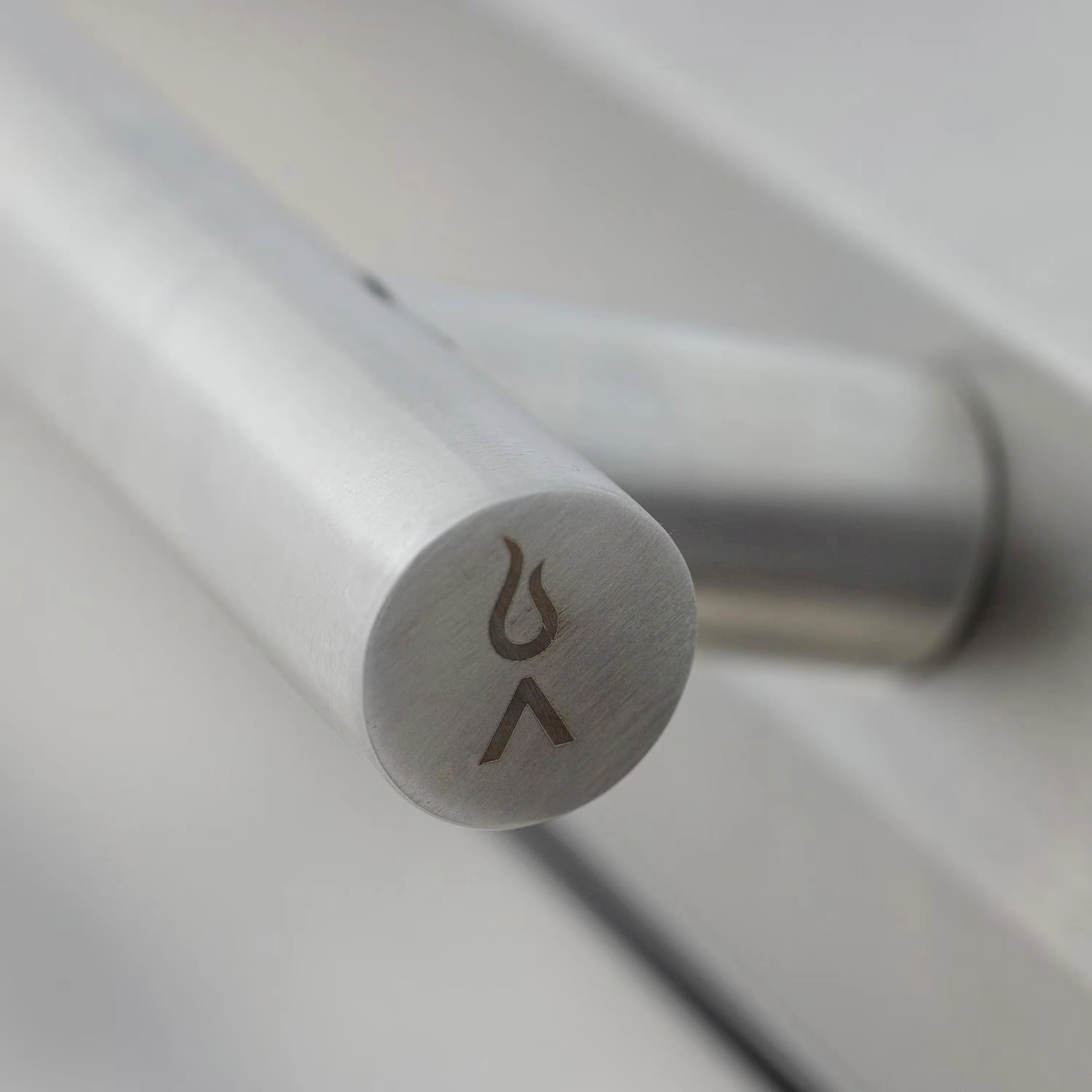 Round control knob with flame icon