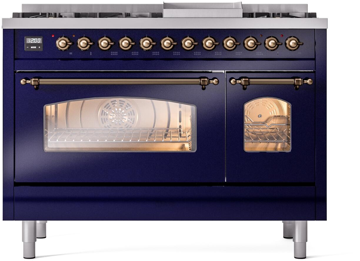 Blue dual fuel freestanding range with brass knobs and oven window