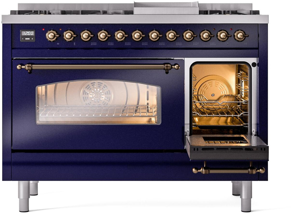 Dual fuel range with one oven door open and the other open compartment