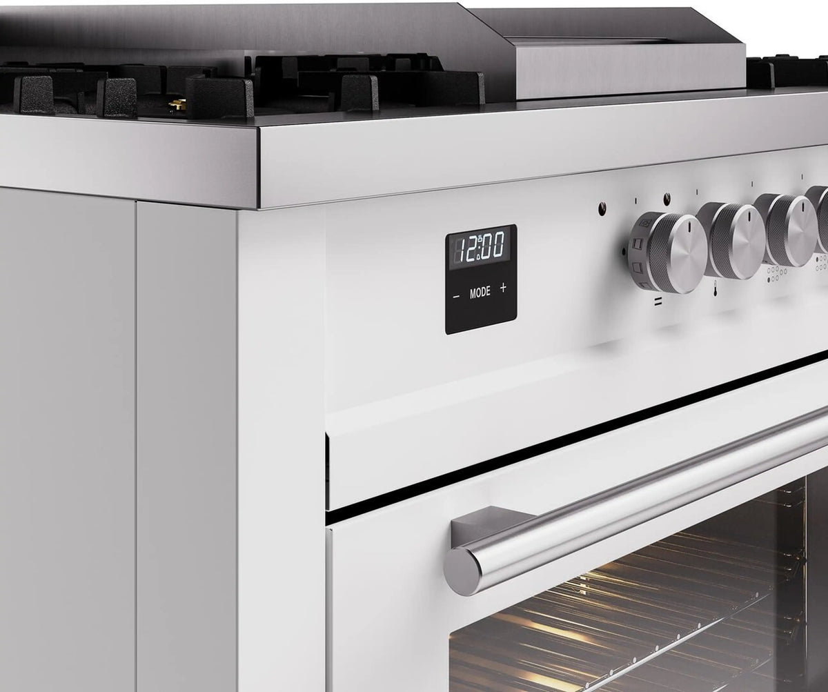 White dual fuel range control panel with knobs and digital display over oven door