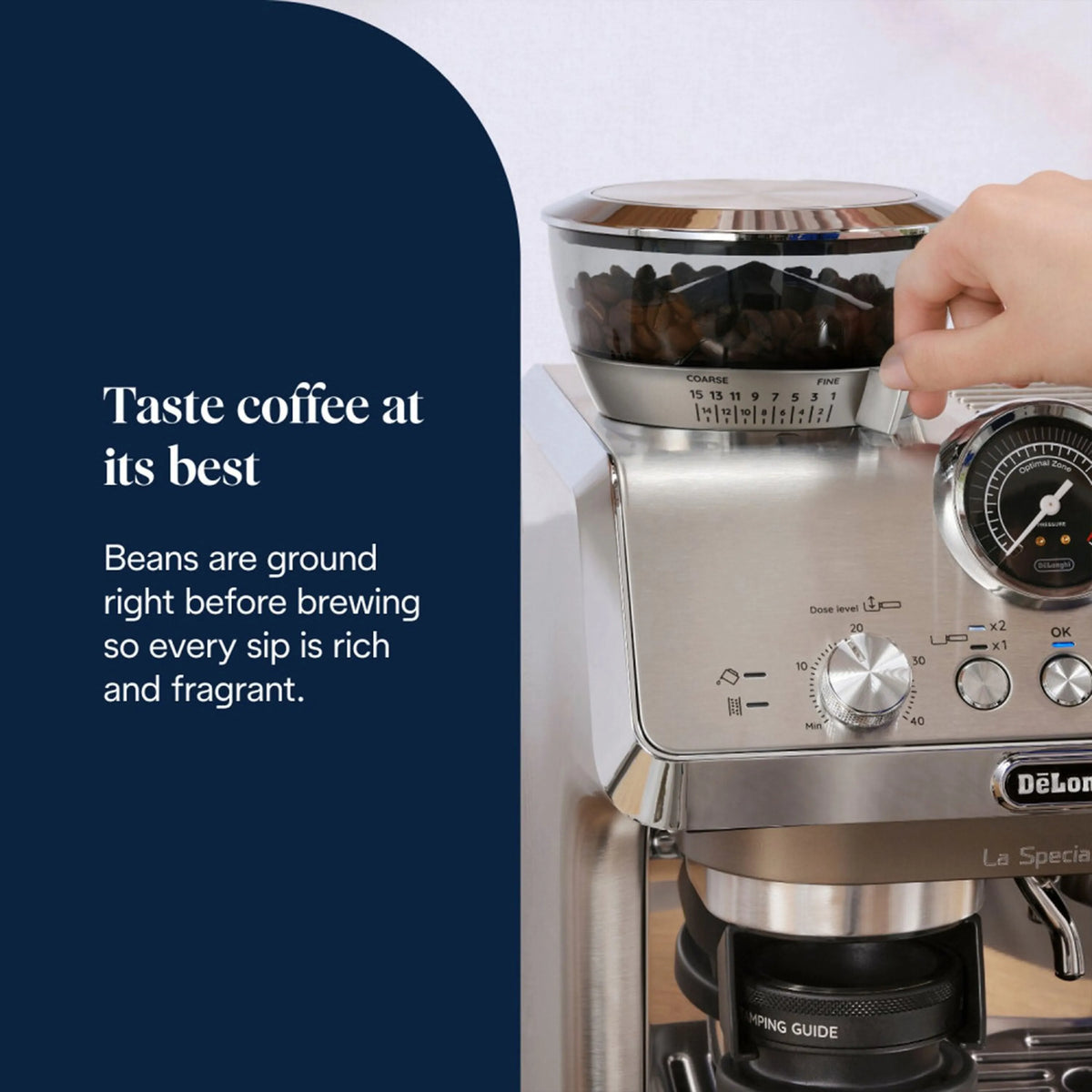 Stainless coffee machine with portafilter and hand holding a dosing container