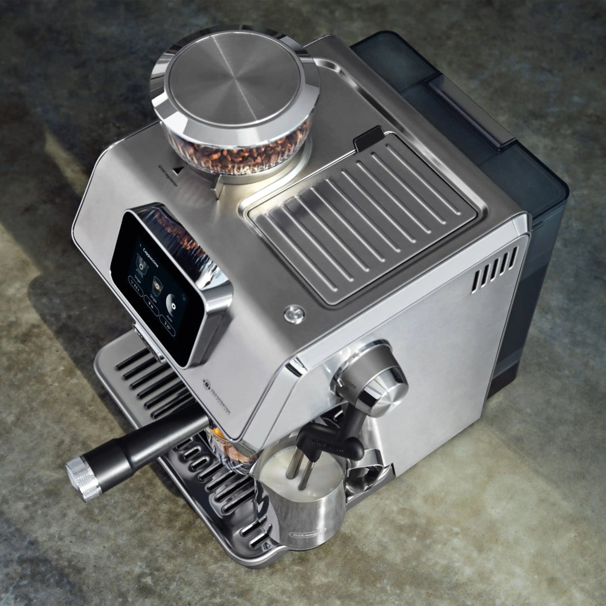 Stainless espresso machine top view with porta-filter and control display