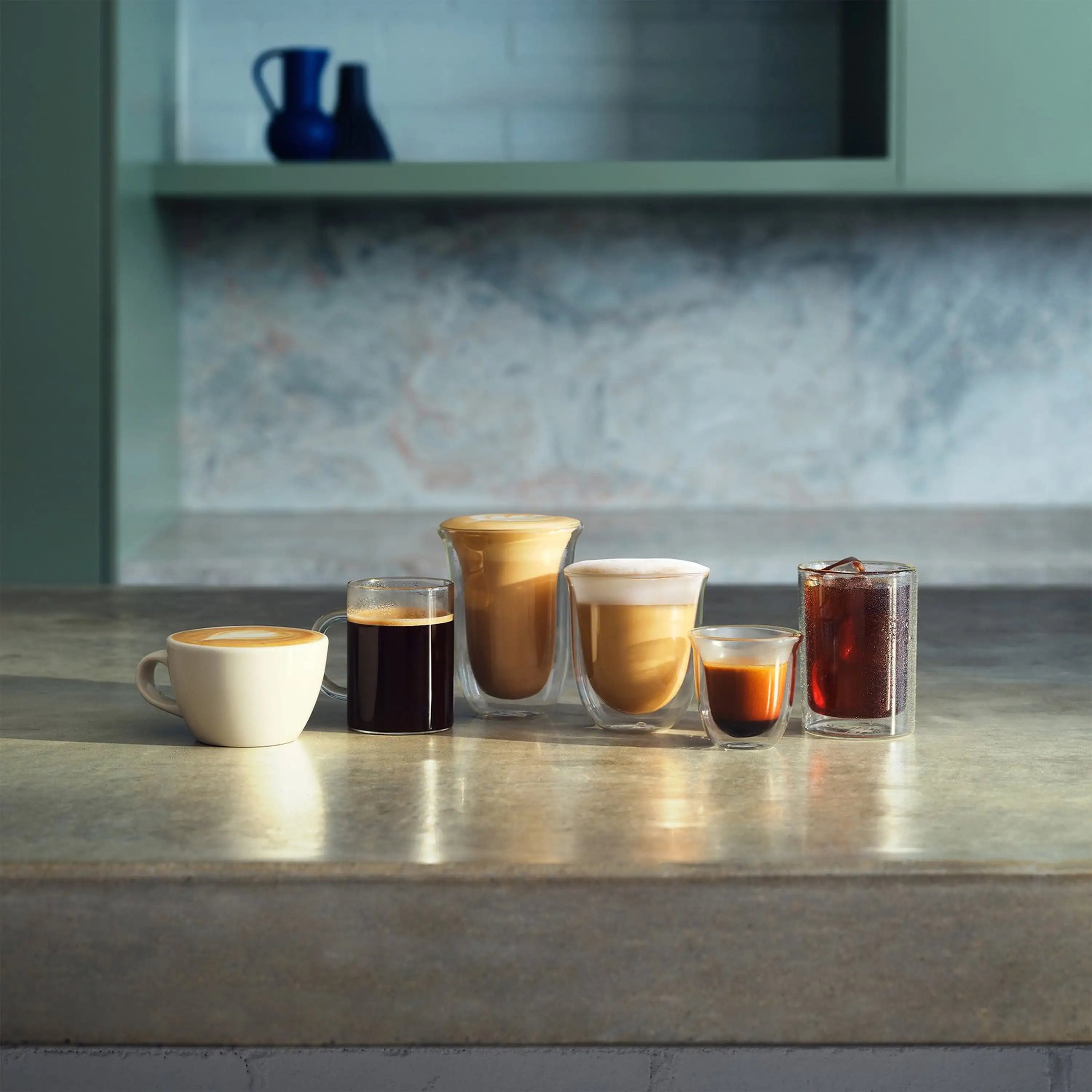 Espresso machine drink serving set with cups of espresso and cold brew