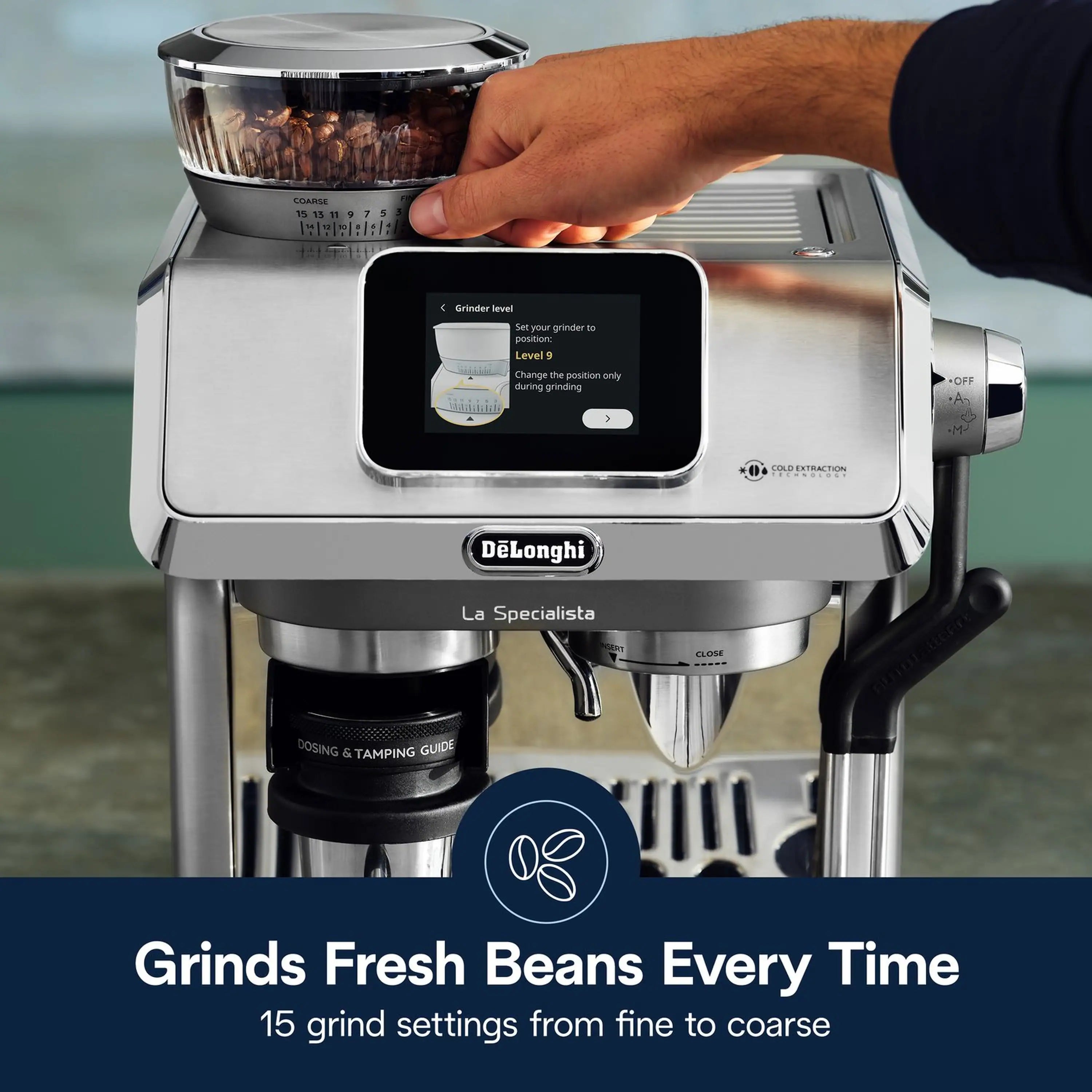Stainless espresso machine with touchscreen display being touched by a hand
