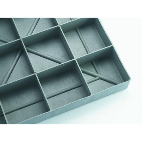 Plastic equipment pad underside with molded square compartments and channels