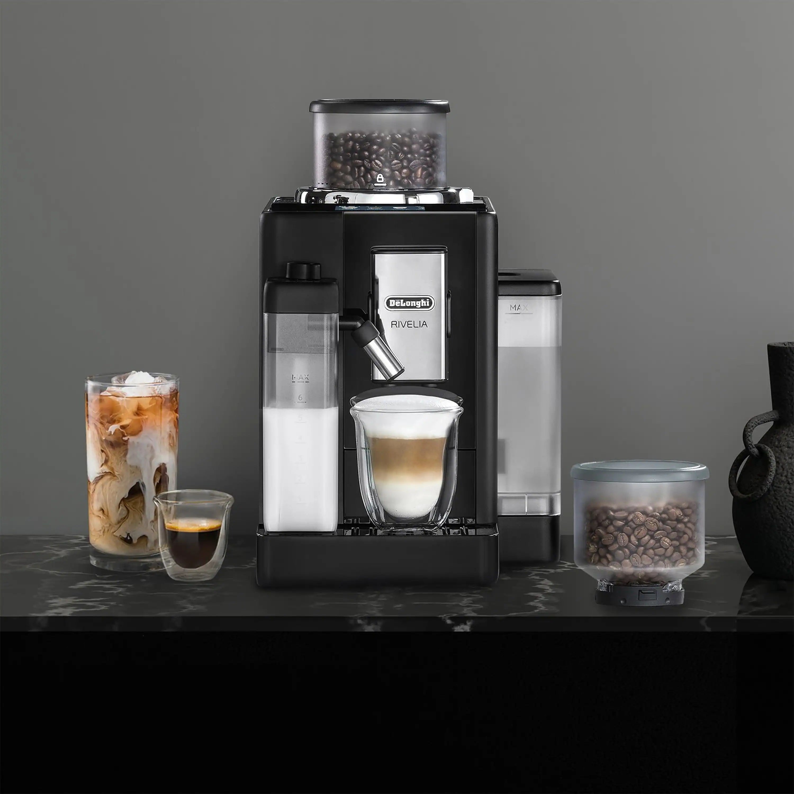 Black fully automatic espresso machine with frothing spout and side water tank