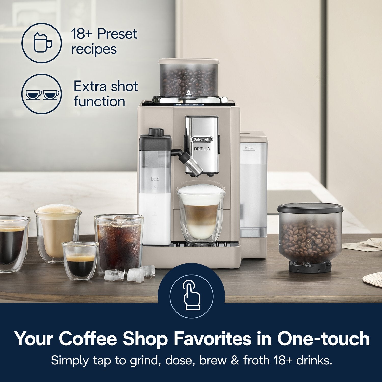 Beige fully automatic espresso machine on countertop with two hoppers and two filled cups