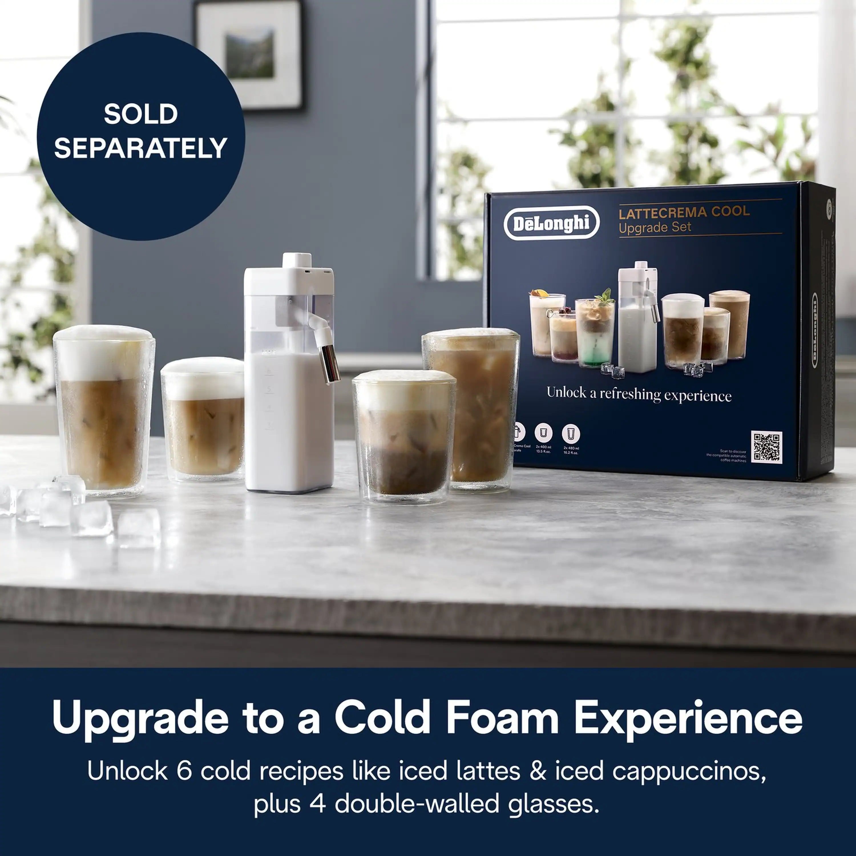 White espresso machine with cold foam glasses and accessory box on a countertop