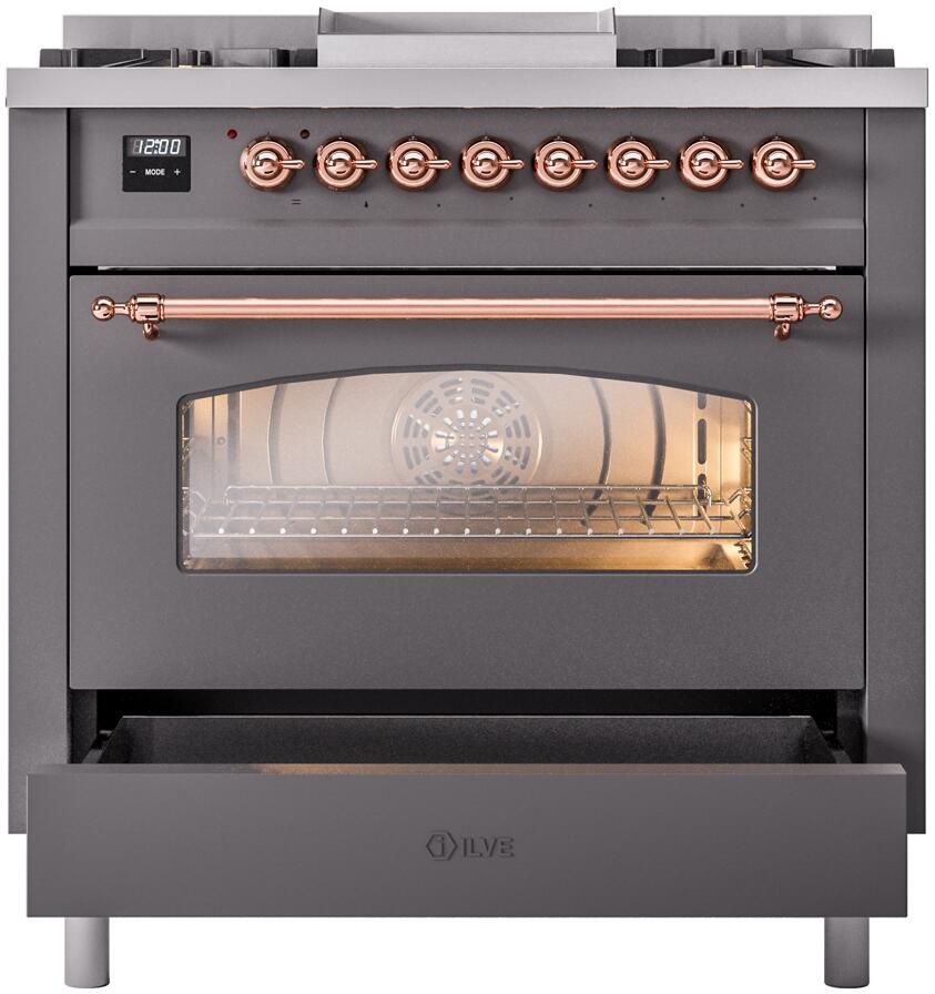 Freestanding dual fuel range front with copper control knobs and open lower storage drawer