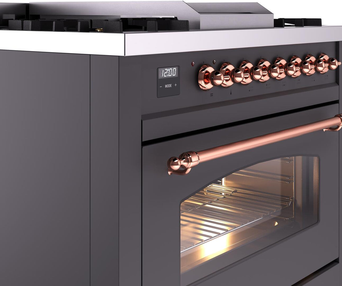 Freestanding dual fuel range control panel with copper knobs and matte graphite oven door