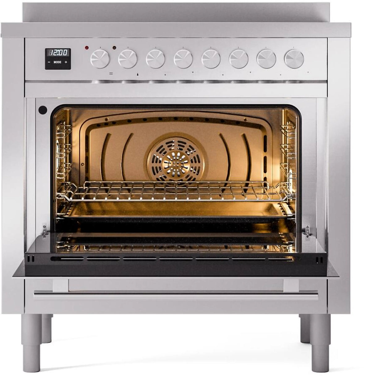 Induction range oven cavity with racks, fan cover, and stainless interior walls