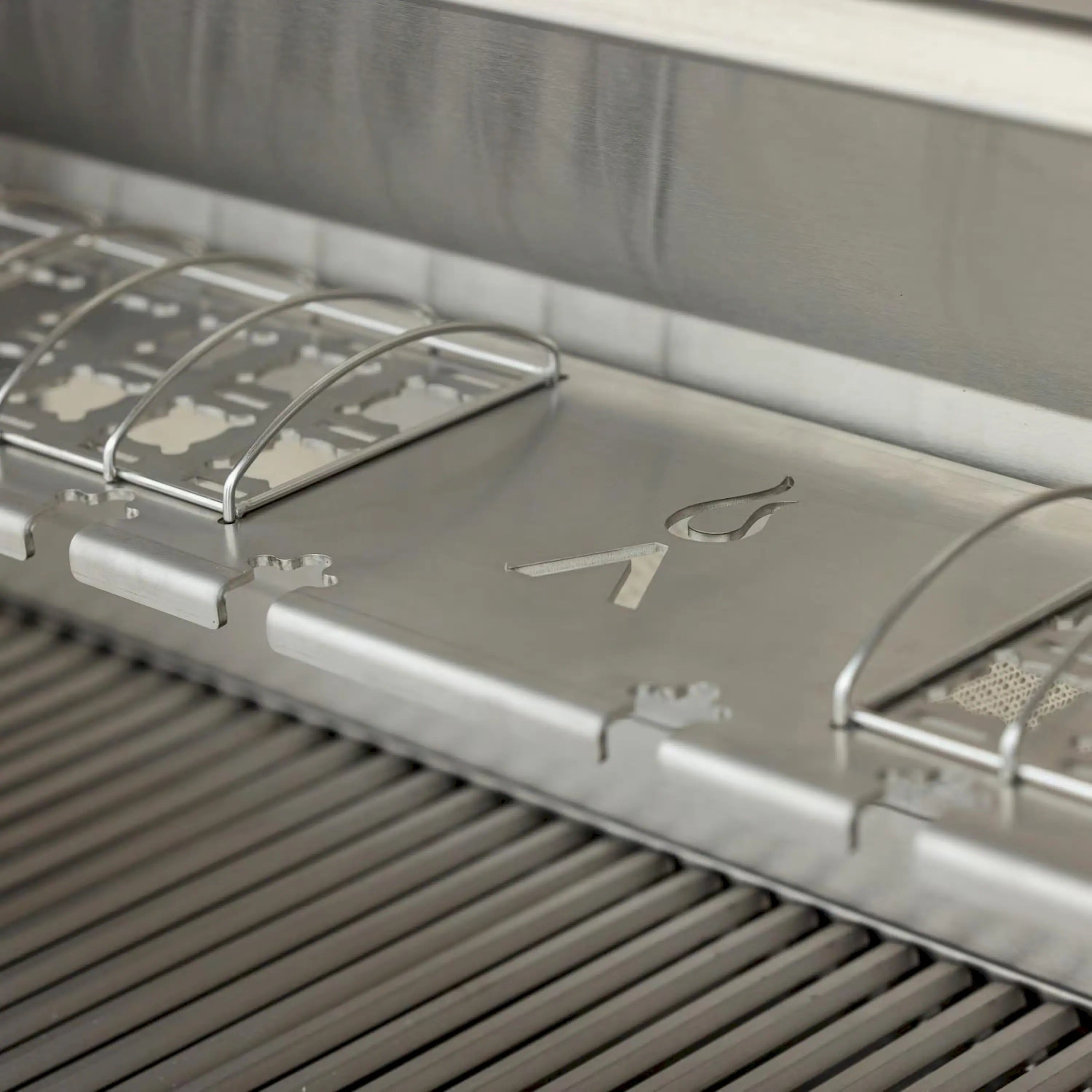 Stainless steel grill back section with utensil hooks and vented warming surface