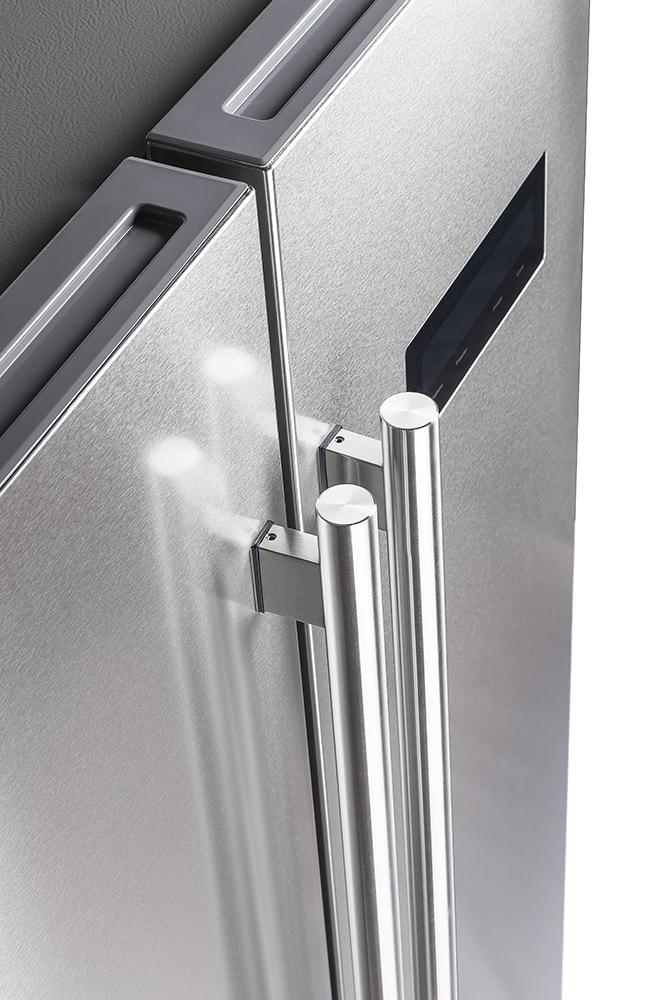 Stainless steel refrigerator door handles with mounting brackets, close-up detail.