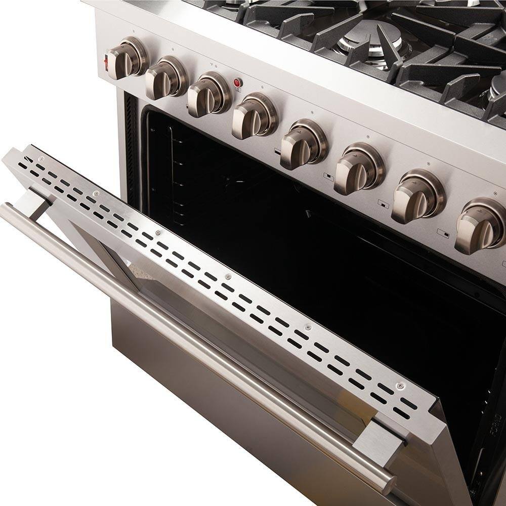 Dual fuel range control panel with stainless steel trim and front knob controls