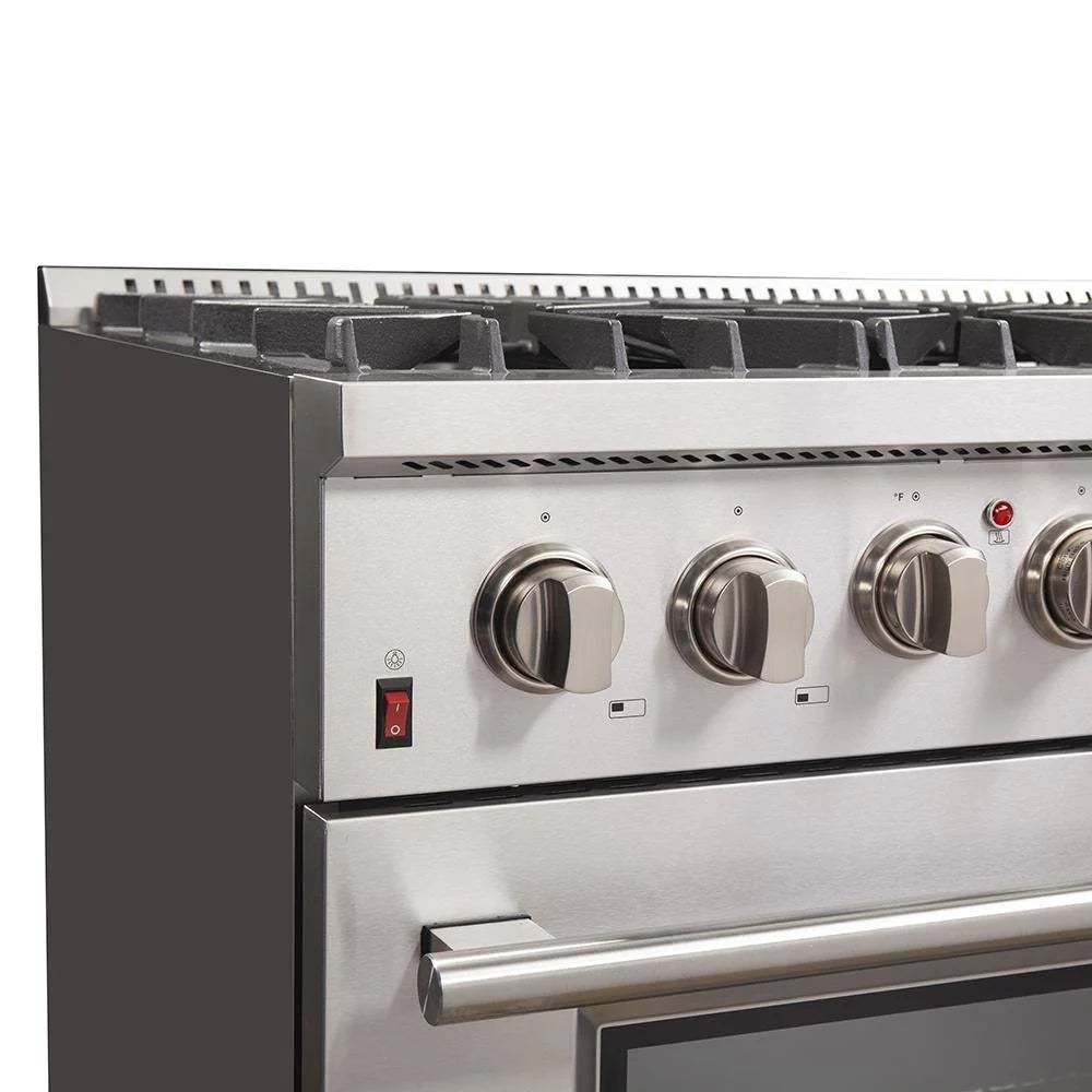 Stainless range control area with multiple round knobs and a recessed side handle