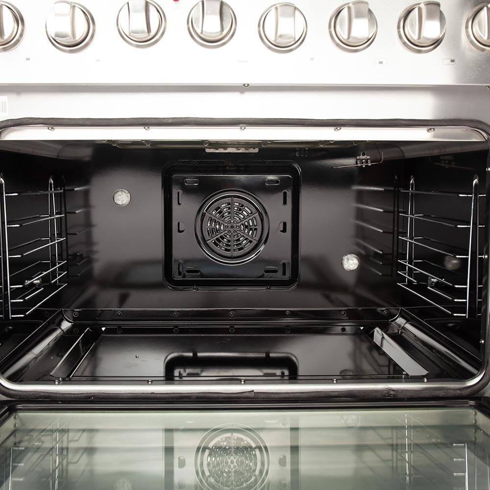Stainless steel dual fuel range oven cavity with broiler vent and racks