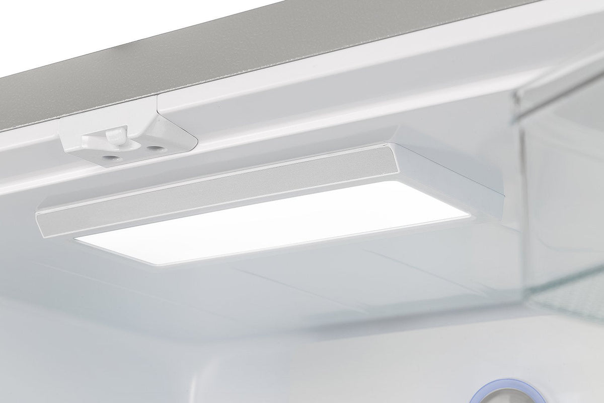 Refrigerator interior ceiling with built-in light and shelf rail detail