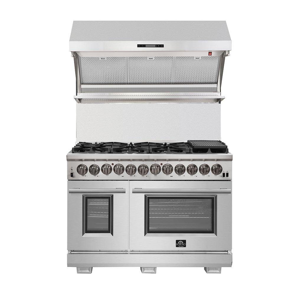 Wall hood with mesh filter panels open above stainless dual-fuel range