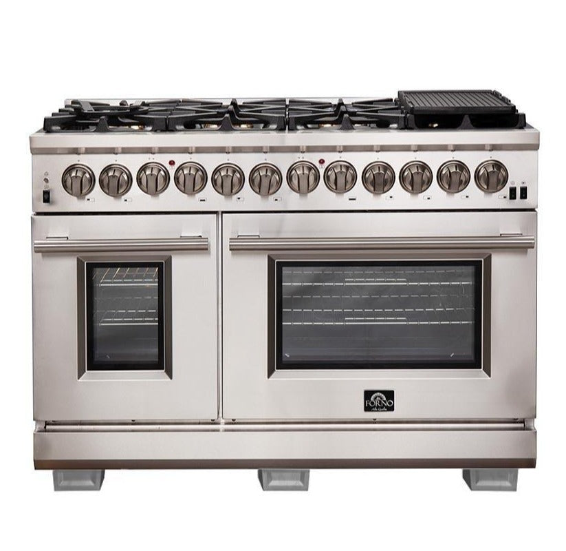 Stainless dual-fuel range with two ovens, black grates, and control knobs