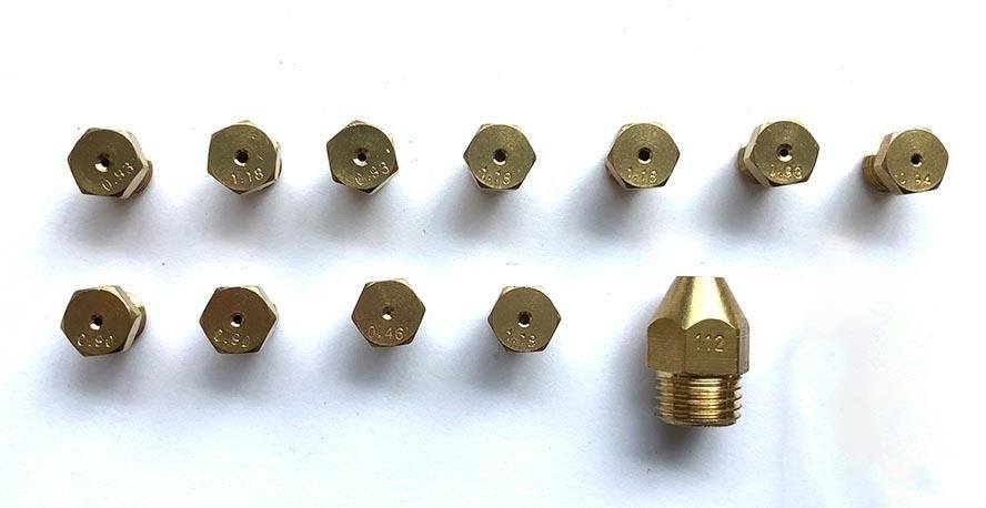 Brass gas burner orifices with threaded bases and hex caps