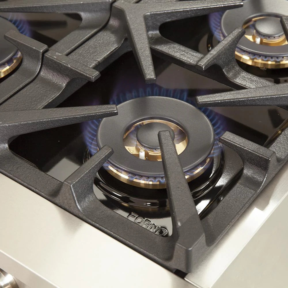 Gas cooktop burner with cast-iron grates and brass flame ports