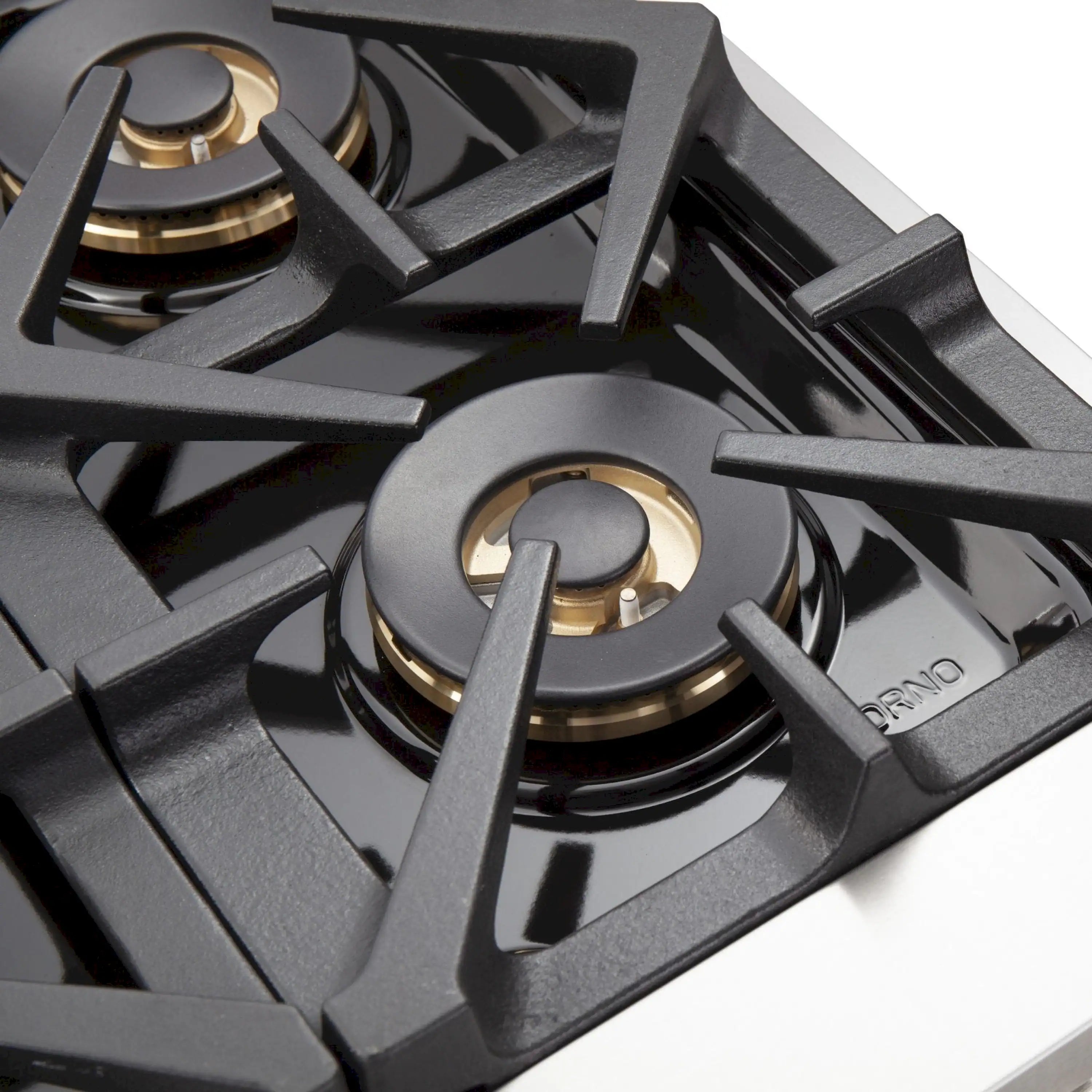 Gas range burner with cast-iron grate and brass-toned burner cap