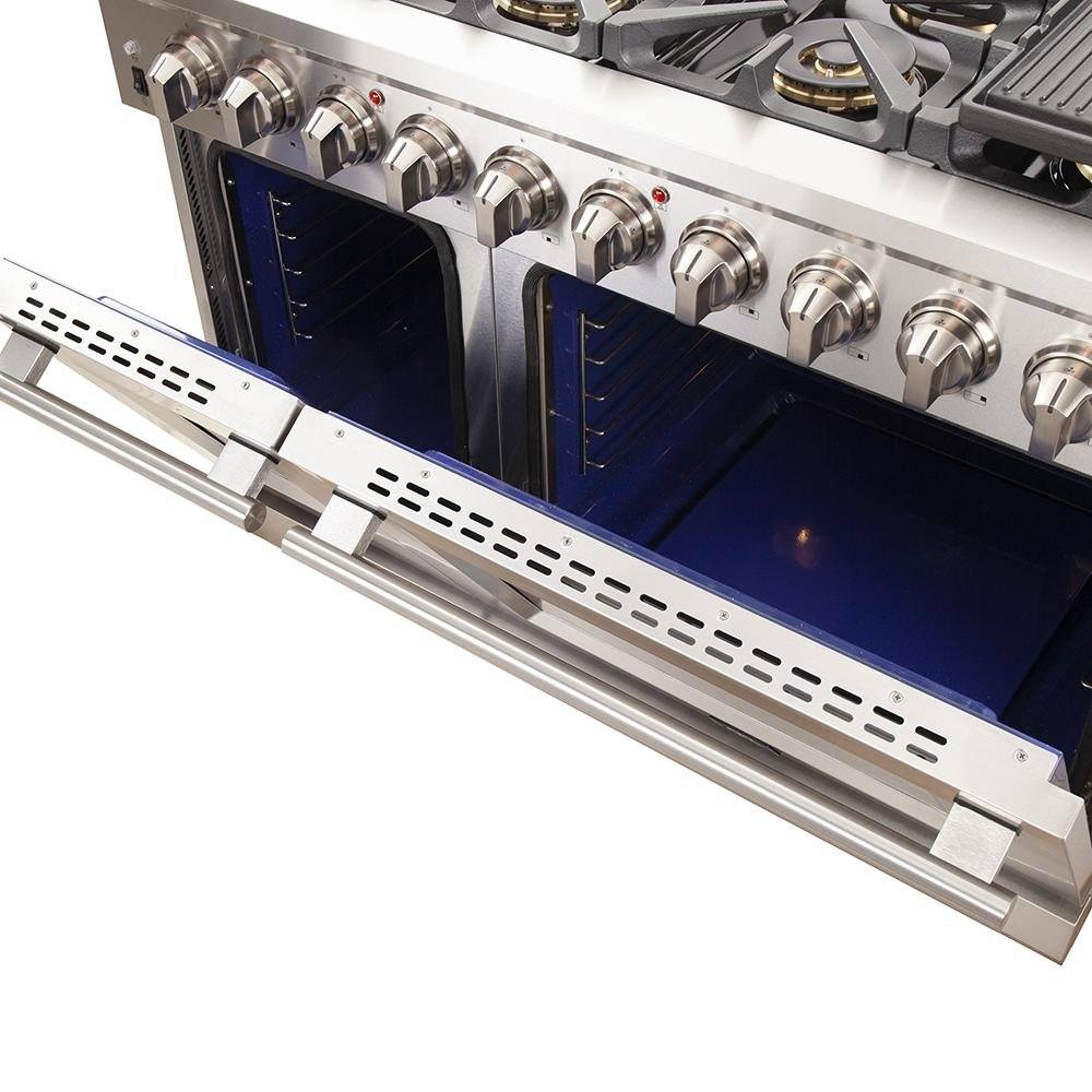 Stainless steel gas range cooktop control knobs with open blue grill area