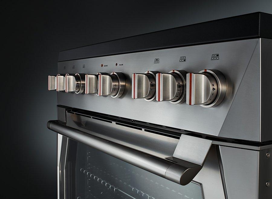 Stainless steel range hood with row of curved control buttons