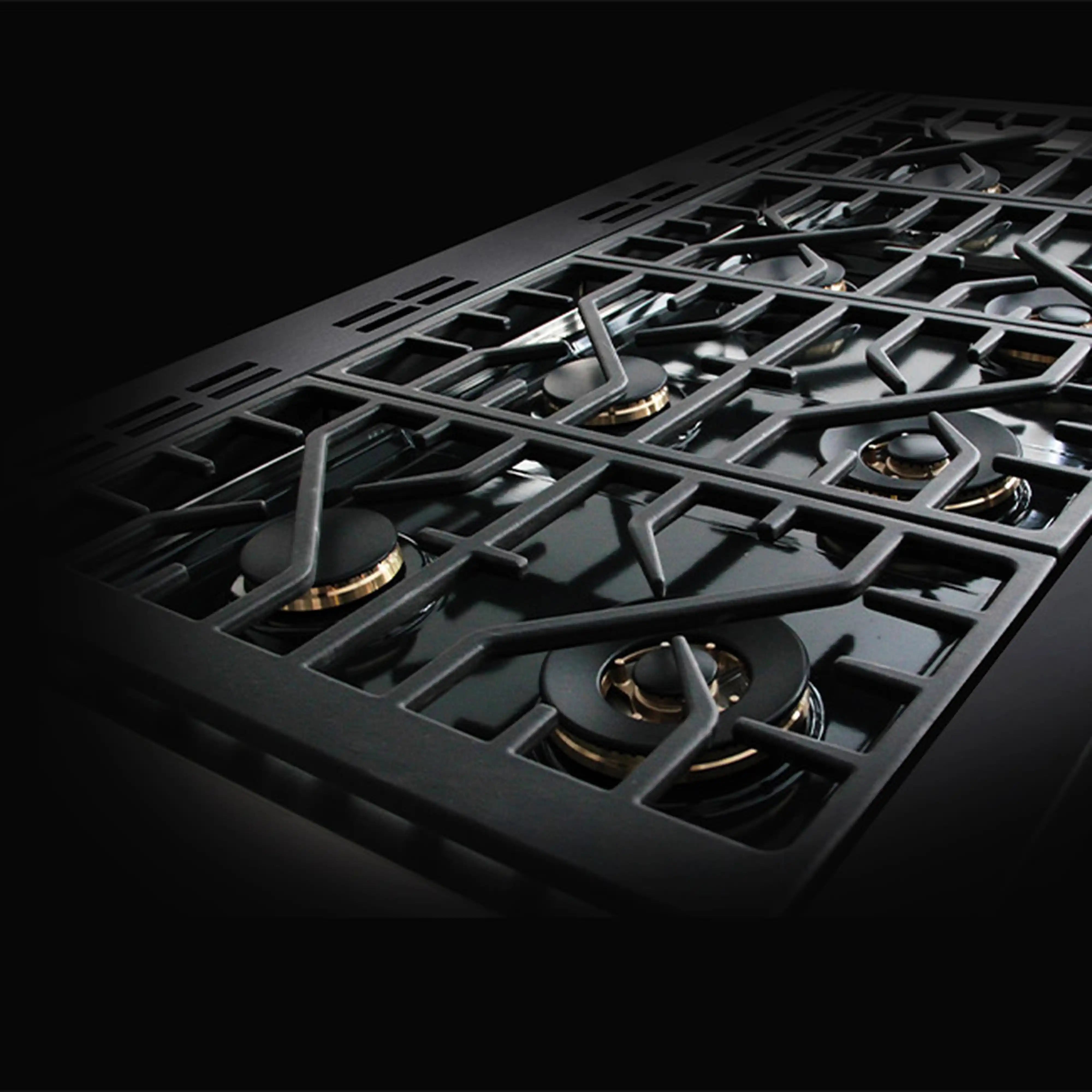 Black cast-iron cooktop grates with dual fuel burner controls and knobs detail