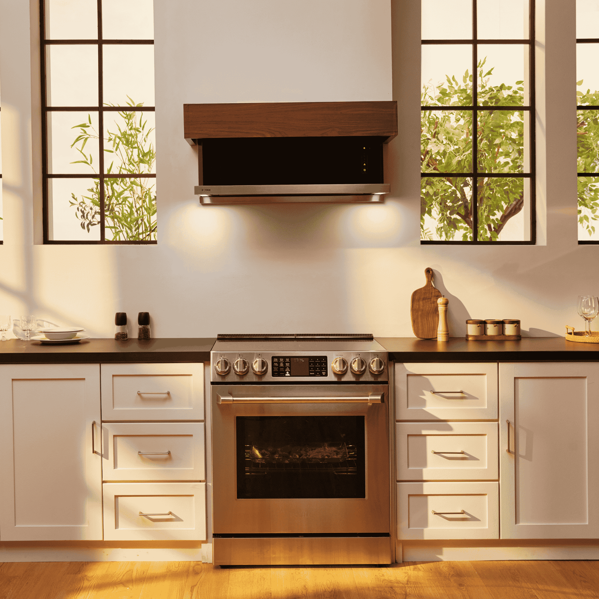 Stainless steel slide-in electric range with oven window, knobs, and cooktop display