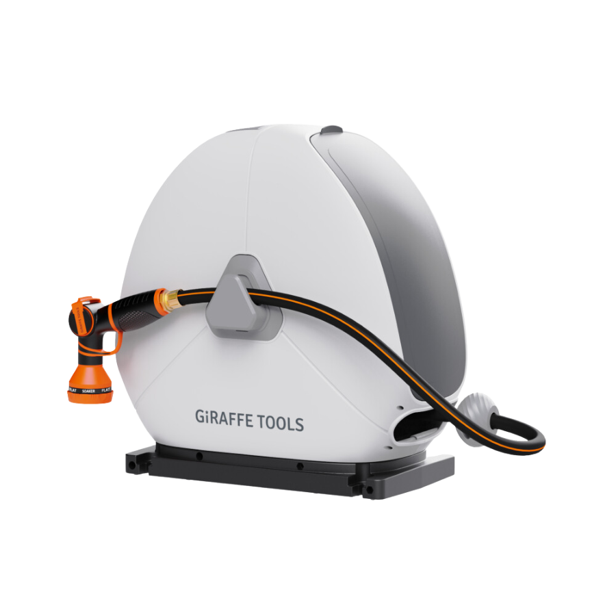 White ground-mounted retractable hose reel with orange nozzle, black hose, and gray stand