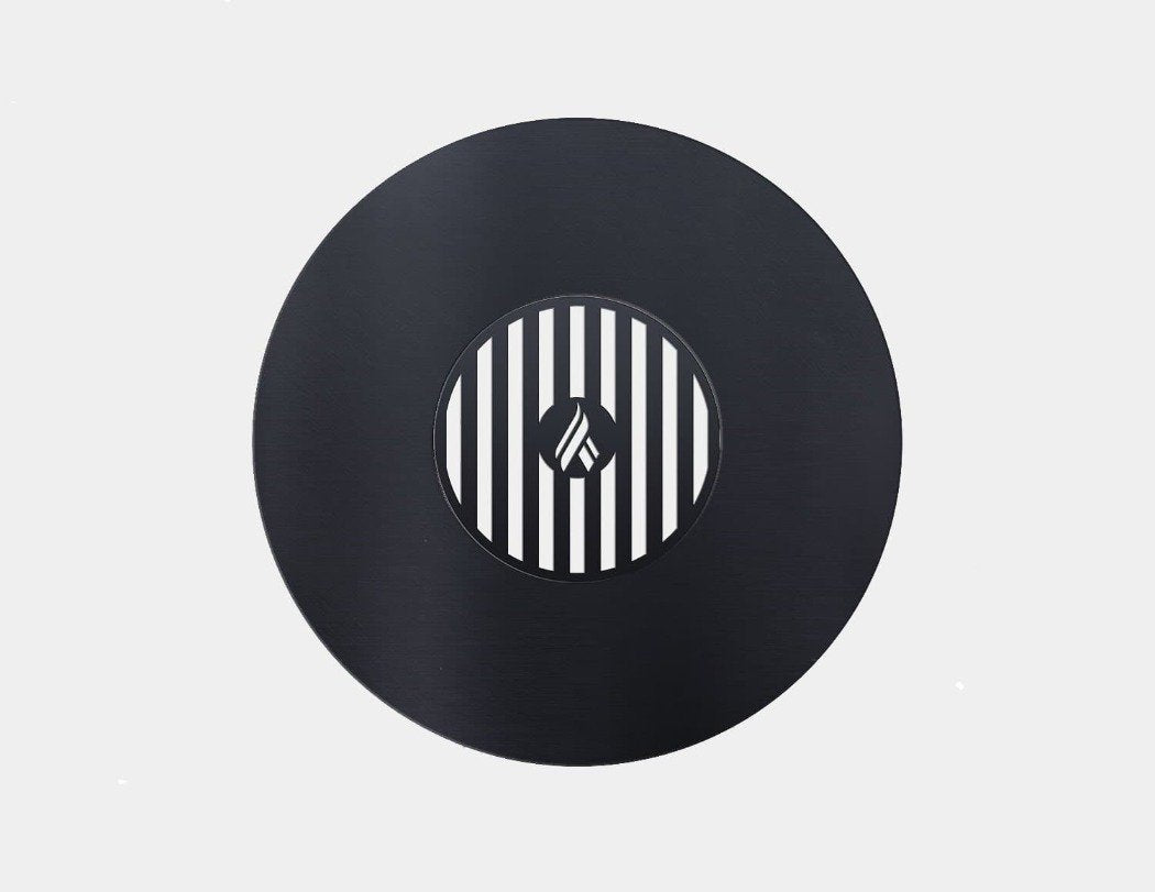 Round black heat shield insert with circular vent stripe pattern