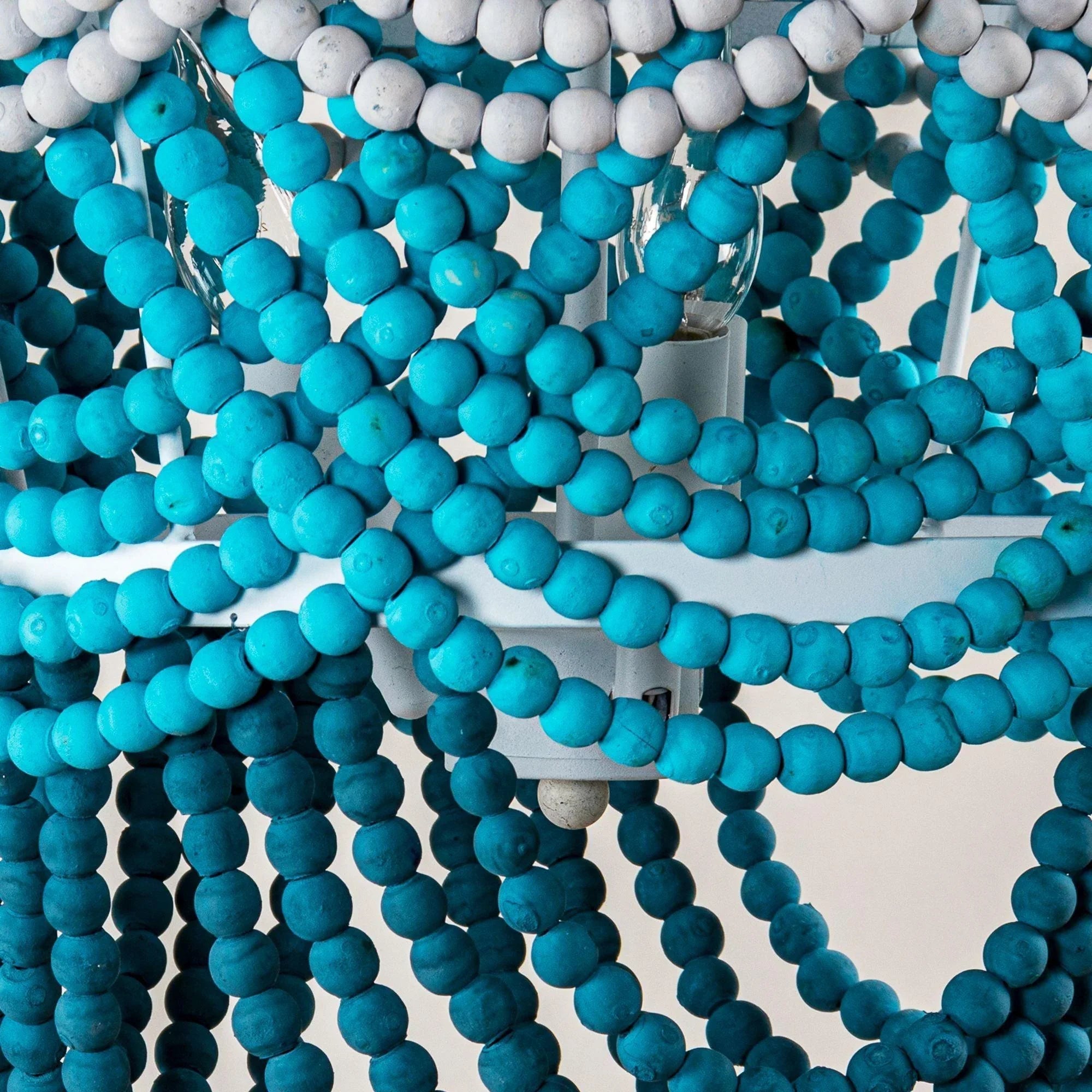 Turquoise beaded chandelier body with layered curved bead strands and metal bulb holders