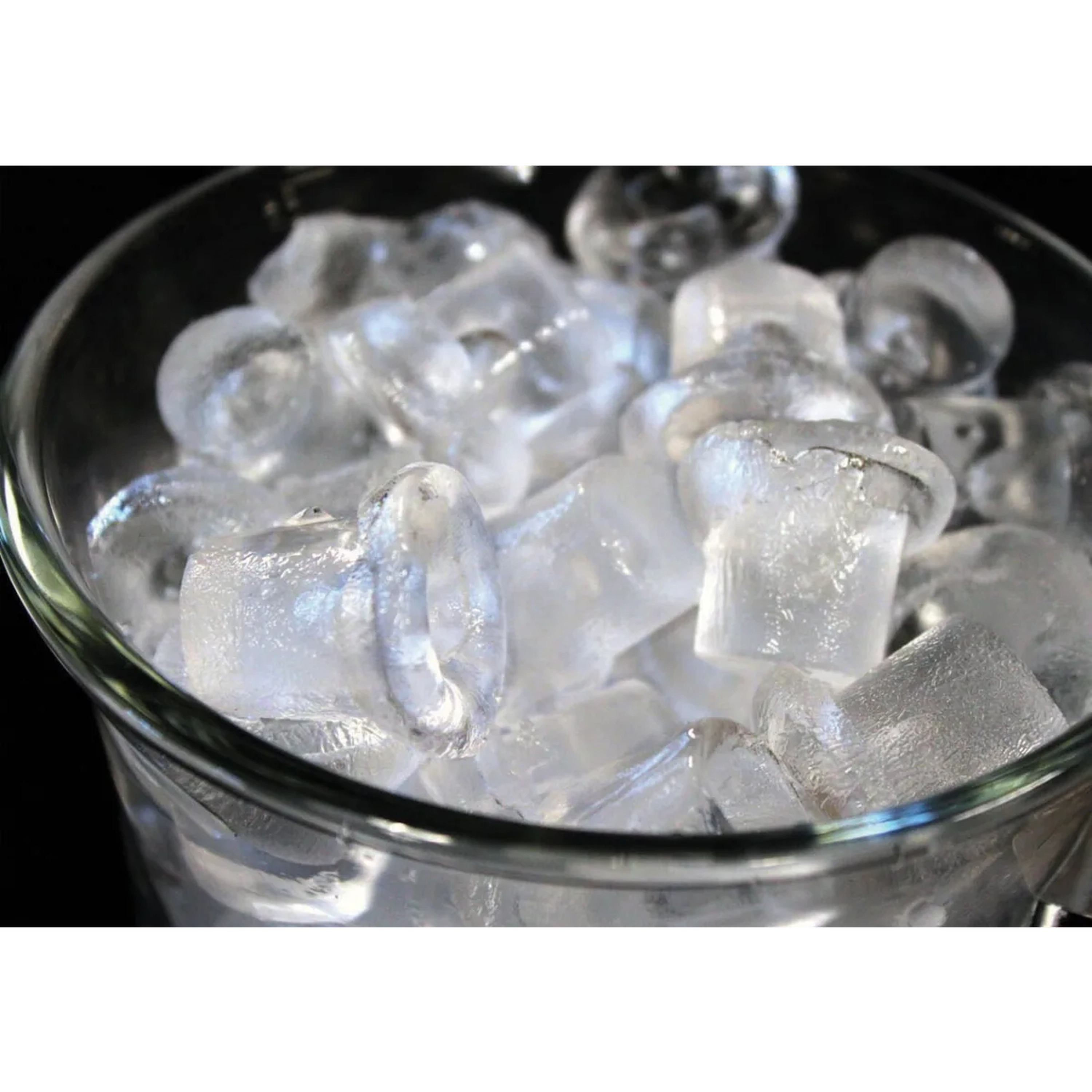 Clear ice cubes in a glass bin