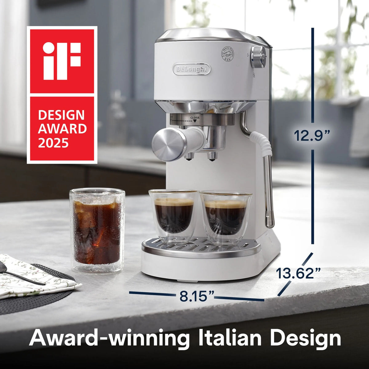Espresso machine on countertop with coffee cups and size measurements shown