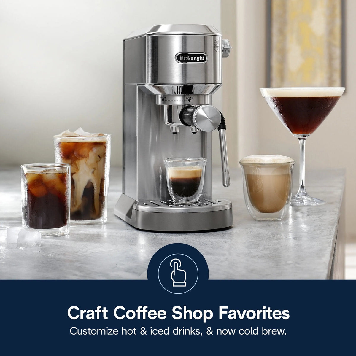 Stainless espresso machine with cold brew cups and a glass cocktail-style drink