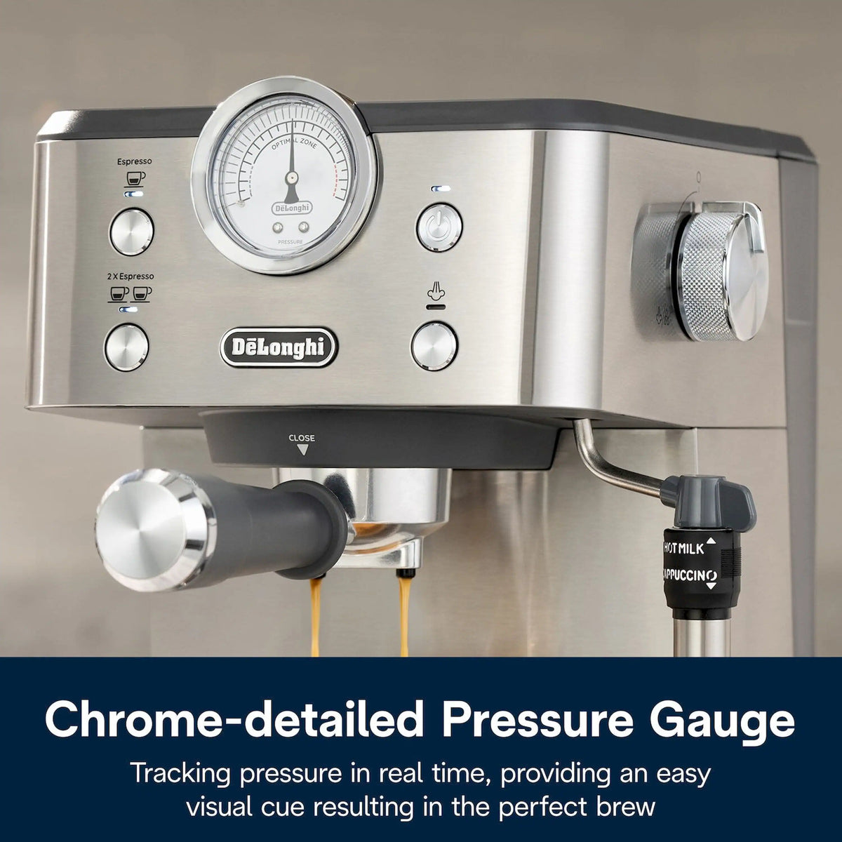 De'Longhi stainless espresso machine with chrome pressure gauge, control knobs, and steam nozzle