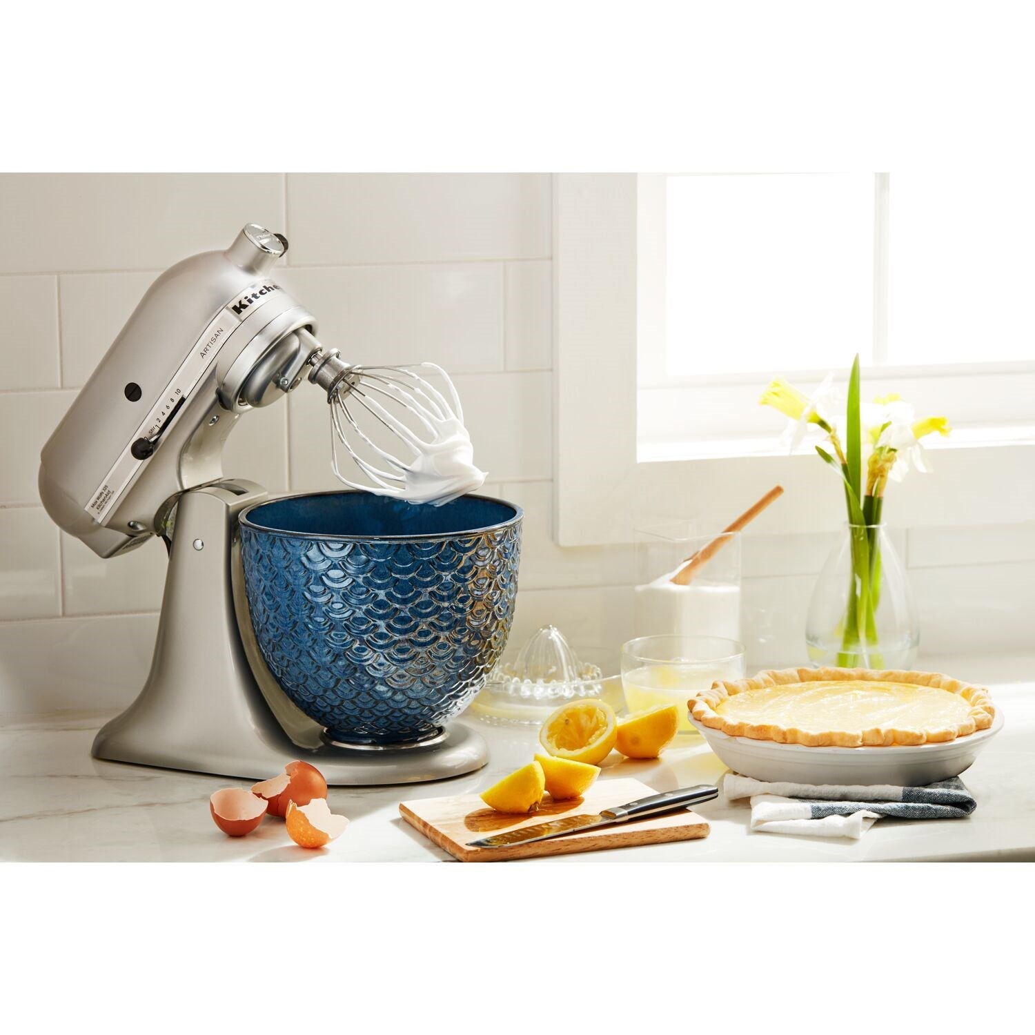 Ceramic mixing bowl with dark blue Mermaid Lace texture on countertop