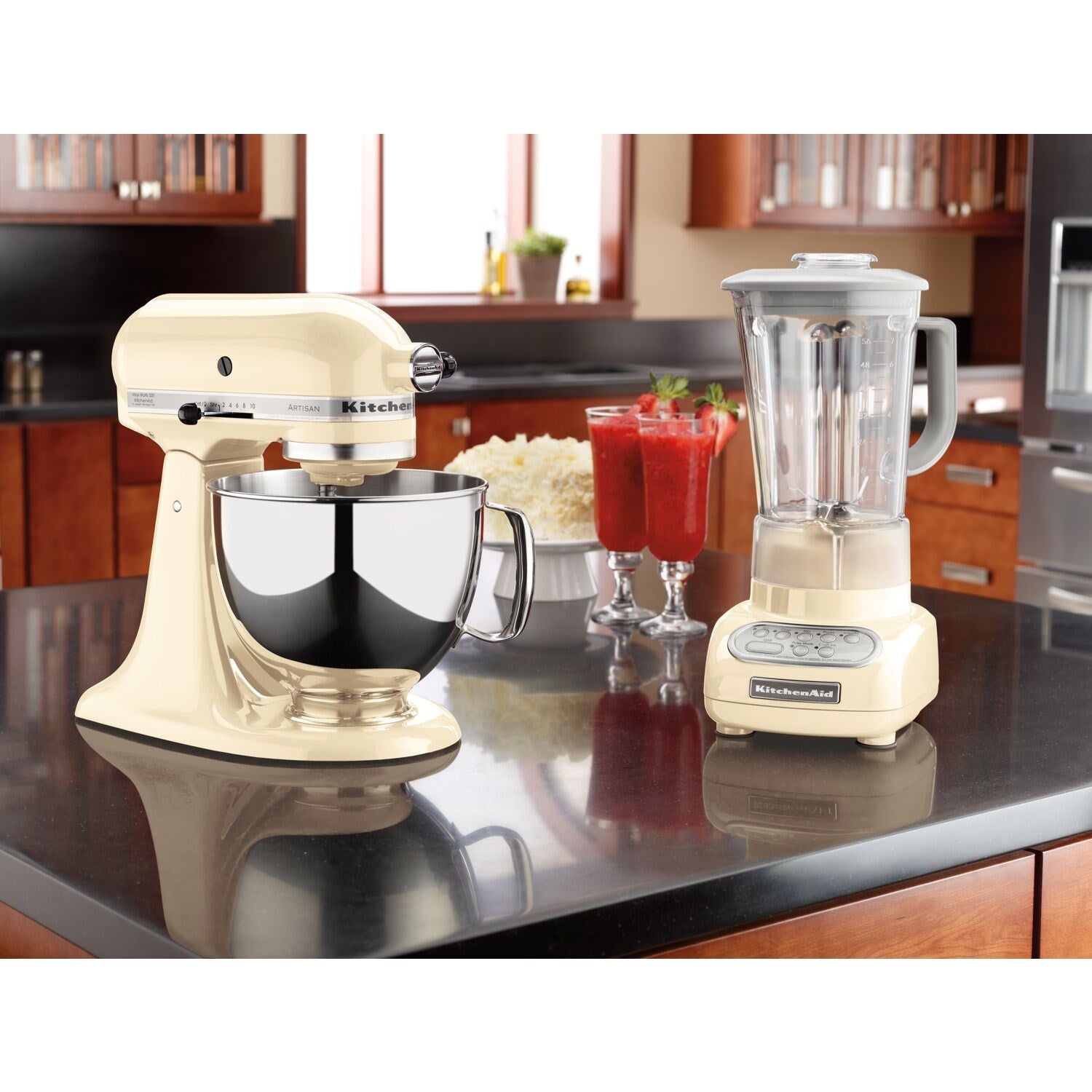 Almond cream tilt-head stand mixer with stainless bowl and beaters on kitchen countertop