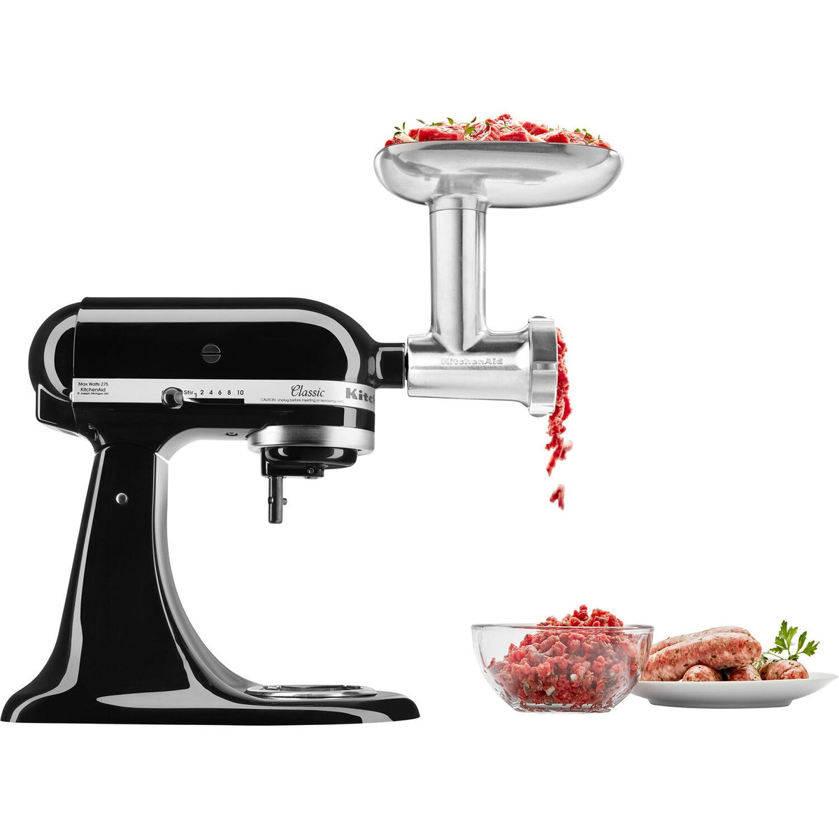 Black KitchenAid stand mixer with metal meat grinder attachment and hopper
