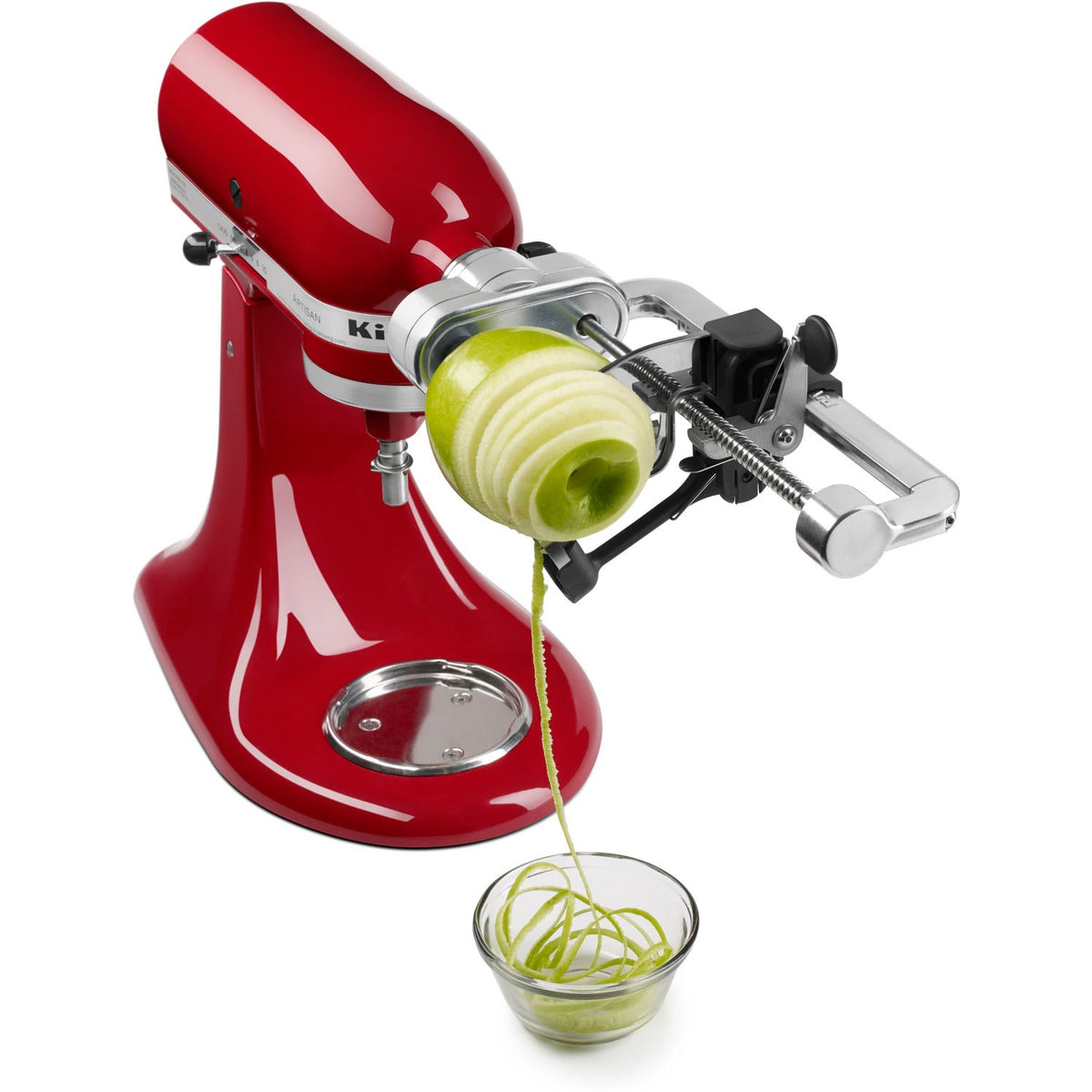 Spiralizer attachment on red stand mixer creating spiral zucchini strands