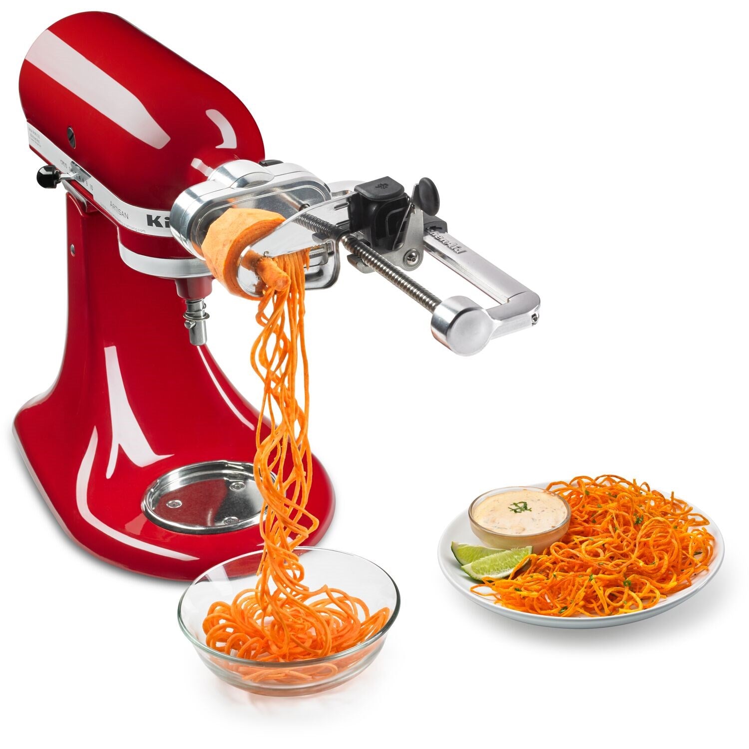 Stand mixer spiralizer attachment making orange vegetable spirals, with crank and chute