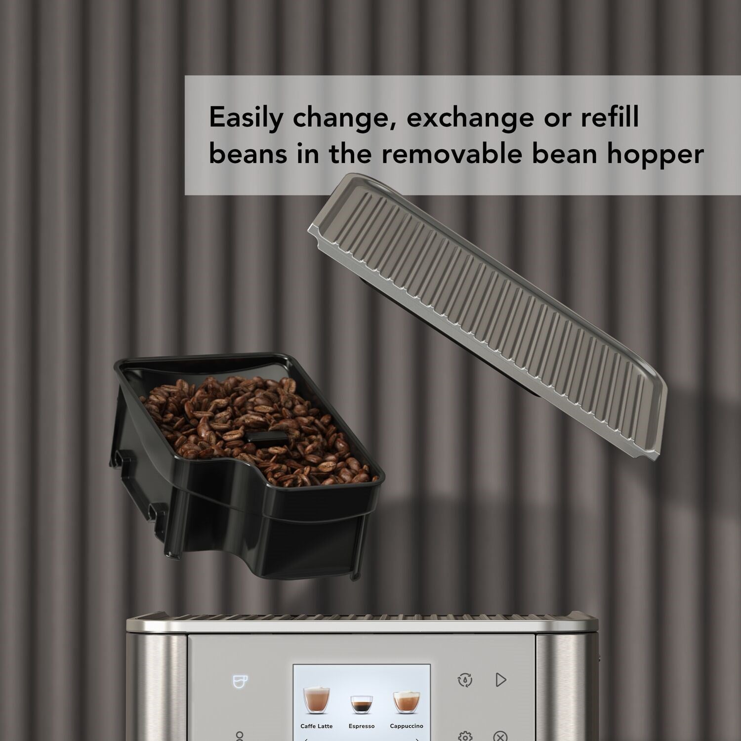Removable bean hopper on black-and-silver espresso machine filled with coffee beans