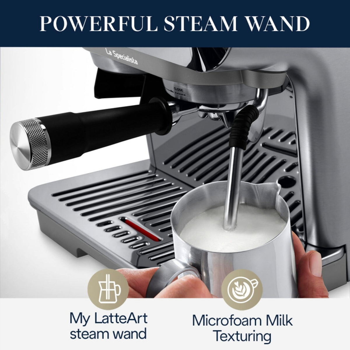 Silver espresso machine steam wand with metal milk pitcher and frothing nozzle